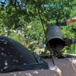 A woman washing her car